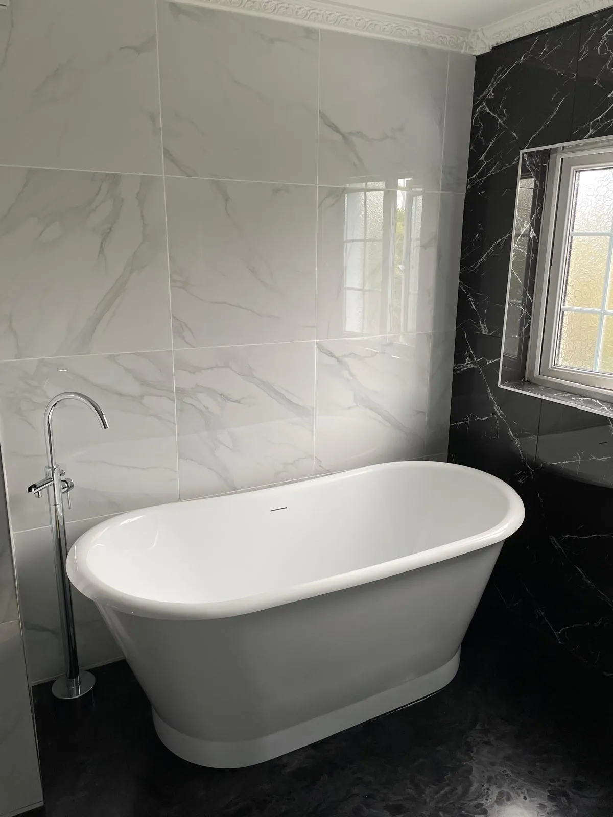 Slate effect walk-in shower fitted in a loft bathroom